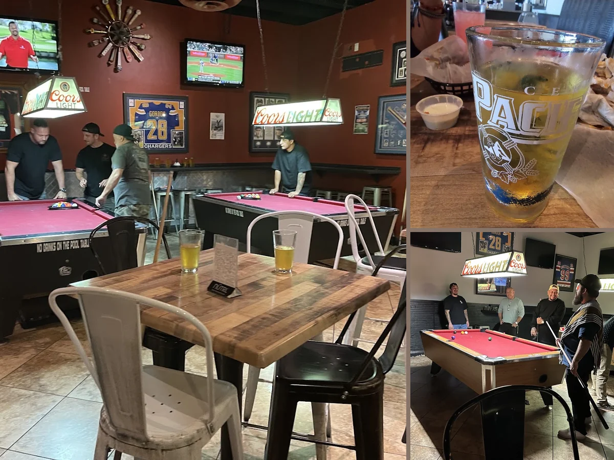Casual sports bar dining room with TV screens.