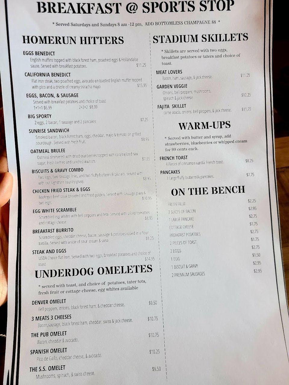 Menu board with food, drinks, and specials.