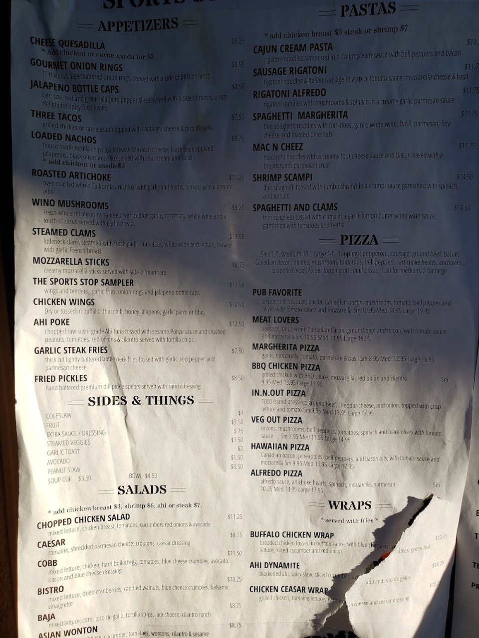 Printed menu with appetizers and weekend breakfast items.